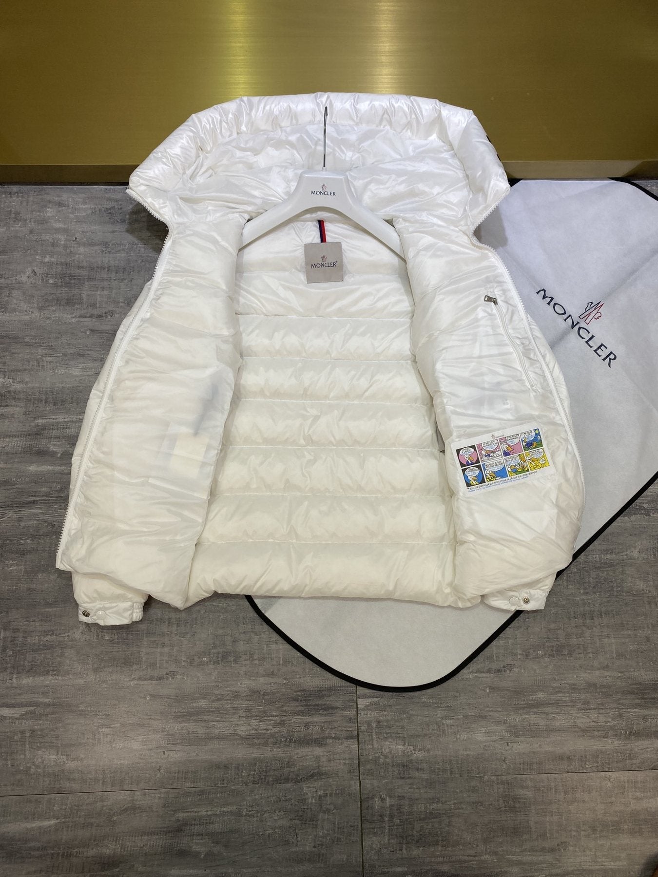 Moncler Hooded Quilted Puffer Coat — hang_tag