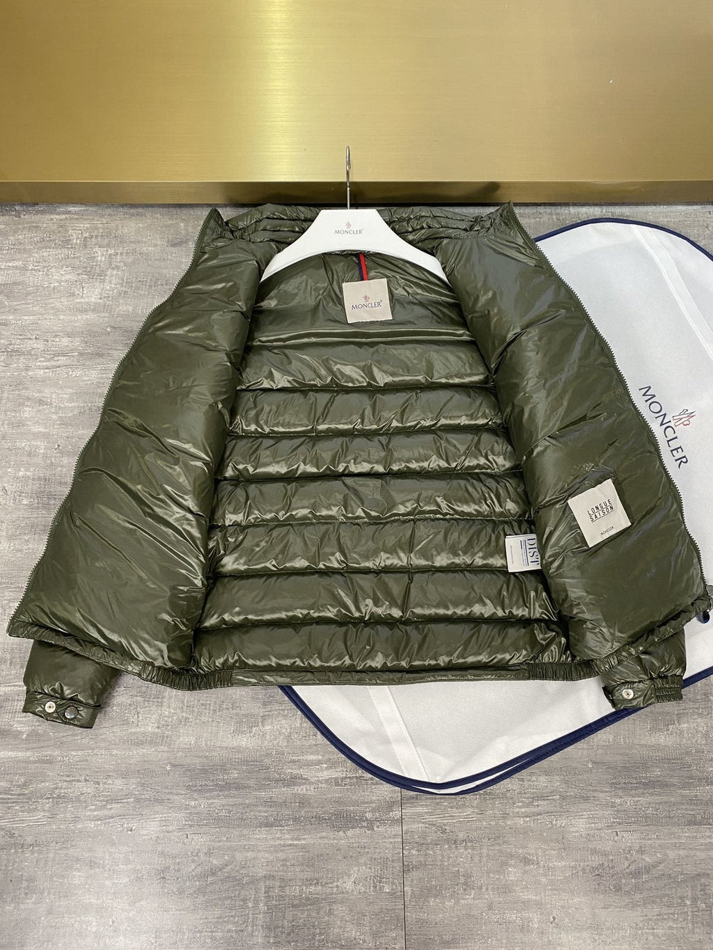 Moncler Lightweight Quilted Puffer Coat — hang_tag