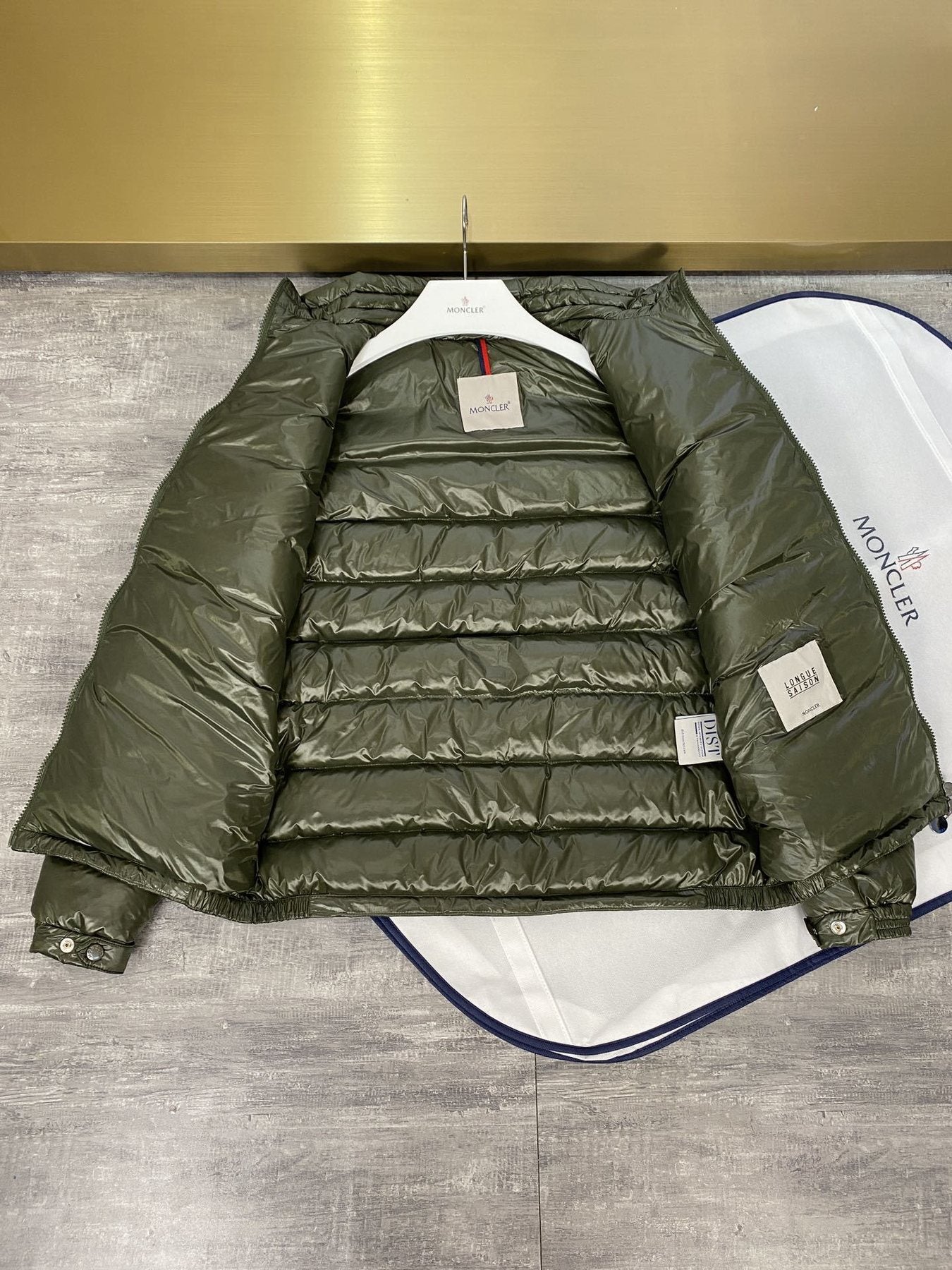 Moncler Lightweight Quilted Puffer Coat — hang_tag