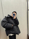AMI Paris Hooded Quilted Puffer Jacket — front