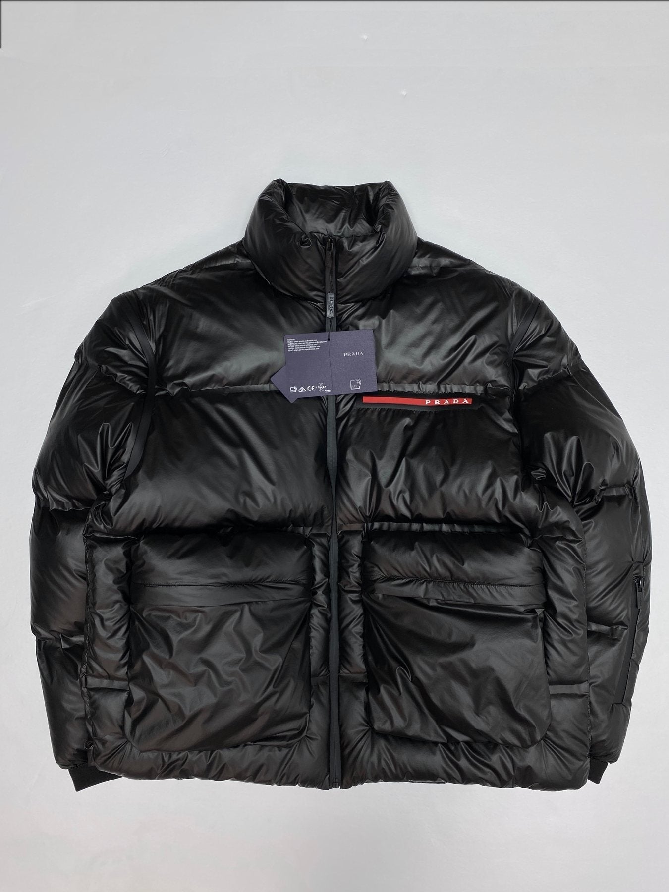 Prada Black Convertible Puffer Jacket with Red Chest Stripe — front