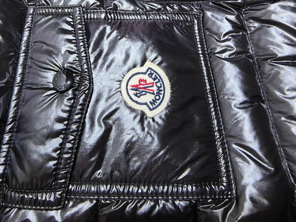 Moncler Hooded Quilted Down Vest — detail