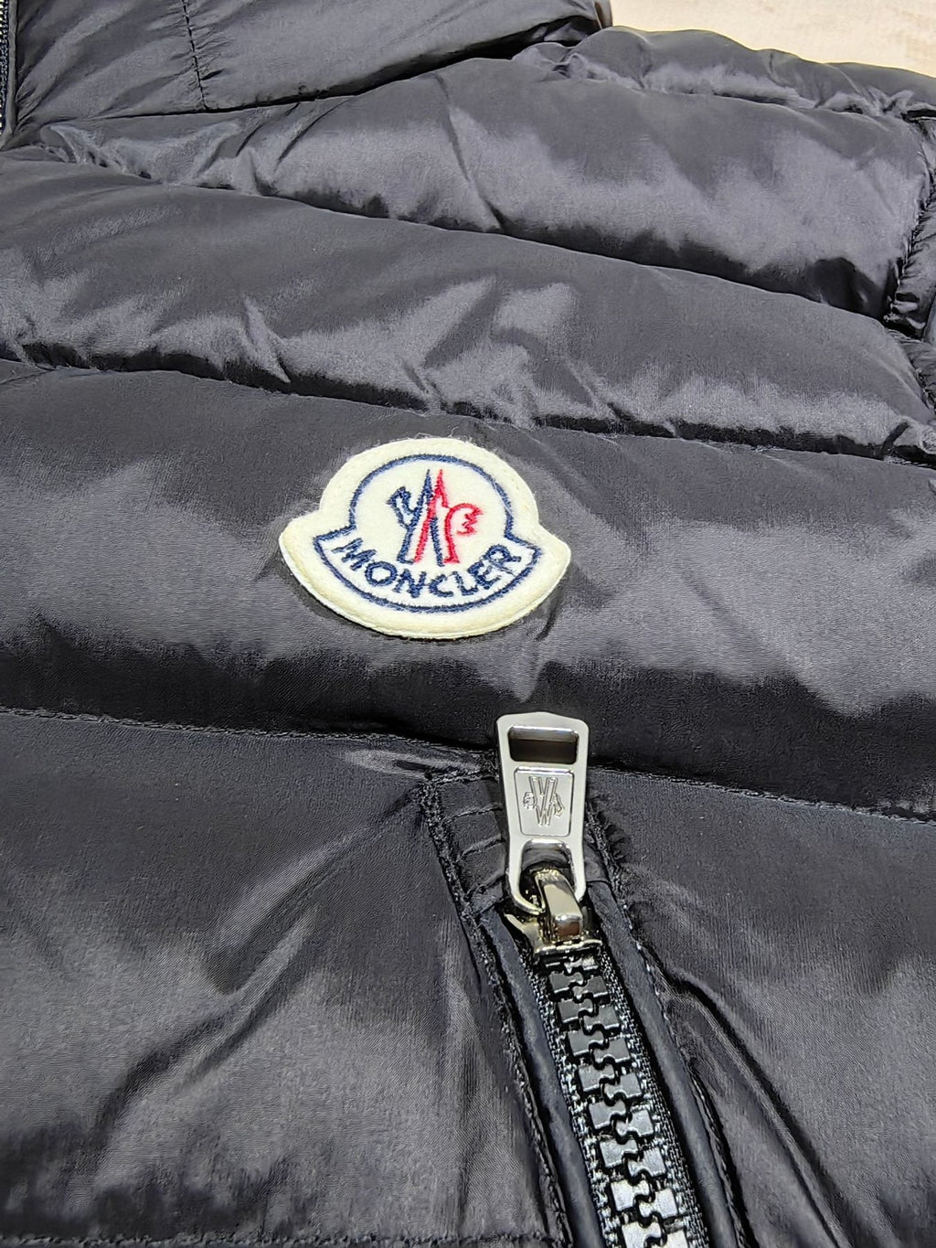 Moncler Hidden Lettering Down Vest — detail