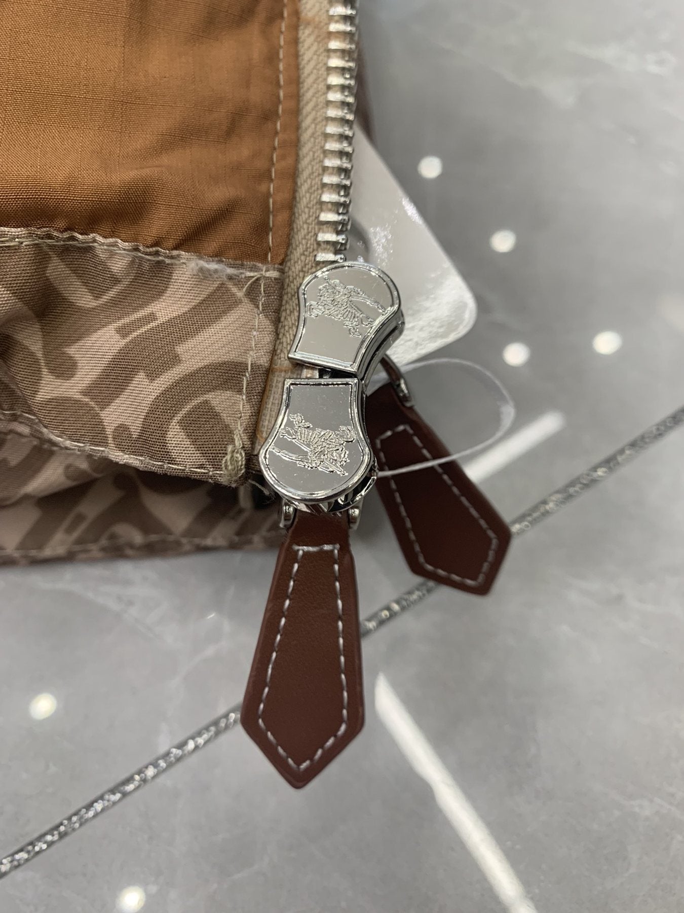 Burberry Monogram Quilted Down Vest — detail