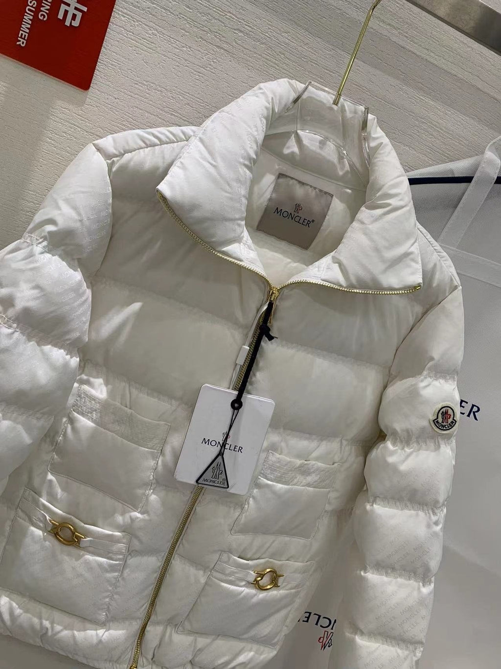 Moncler Multi-Pocket Quilted Puffer Coat — detail