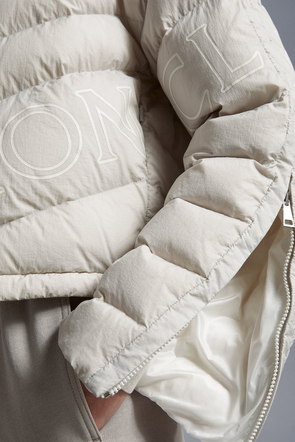 Moncler Letter Graphic Cropped Puffer Coat — fabric_closeup