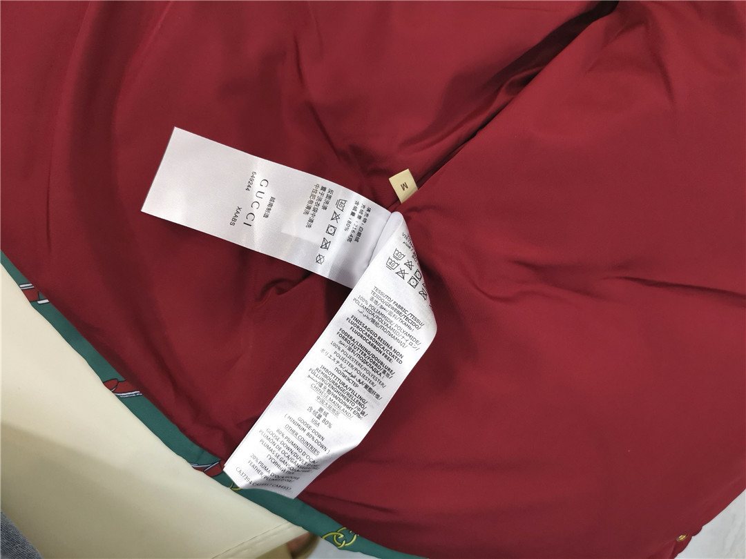 The North Face Gucci Padded Snap-Front Vest — neck_label