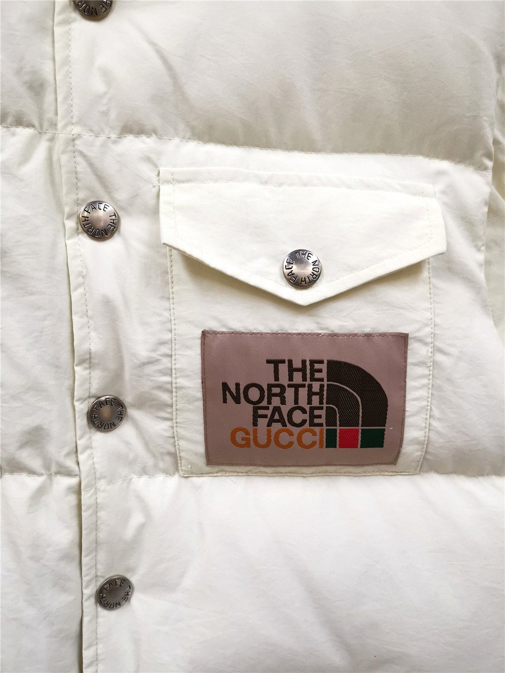 The North Face Gucci Padded Snap-Front Vest — detail
