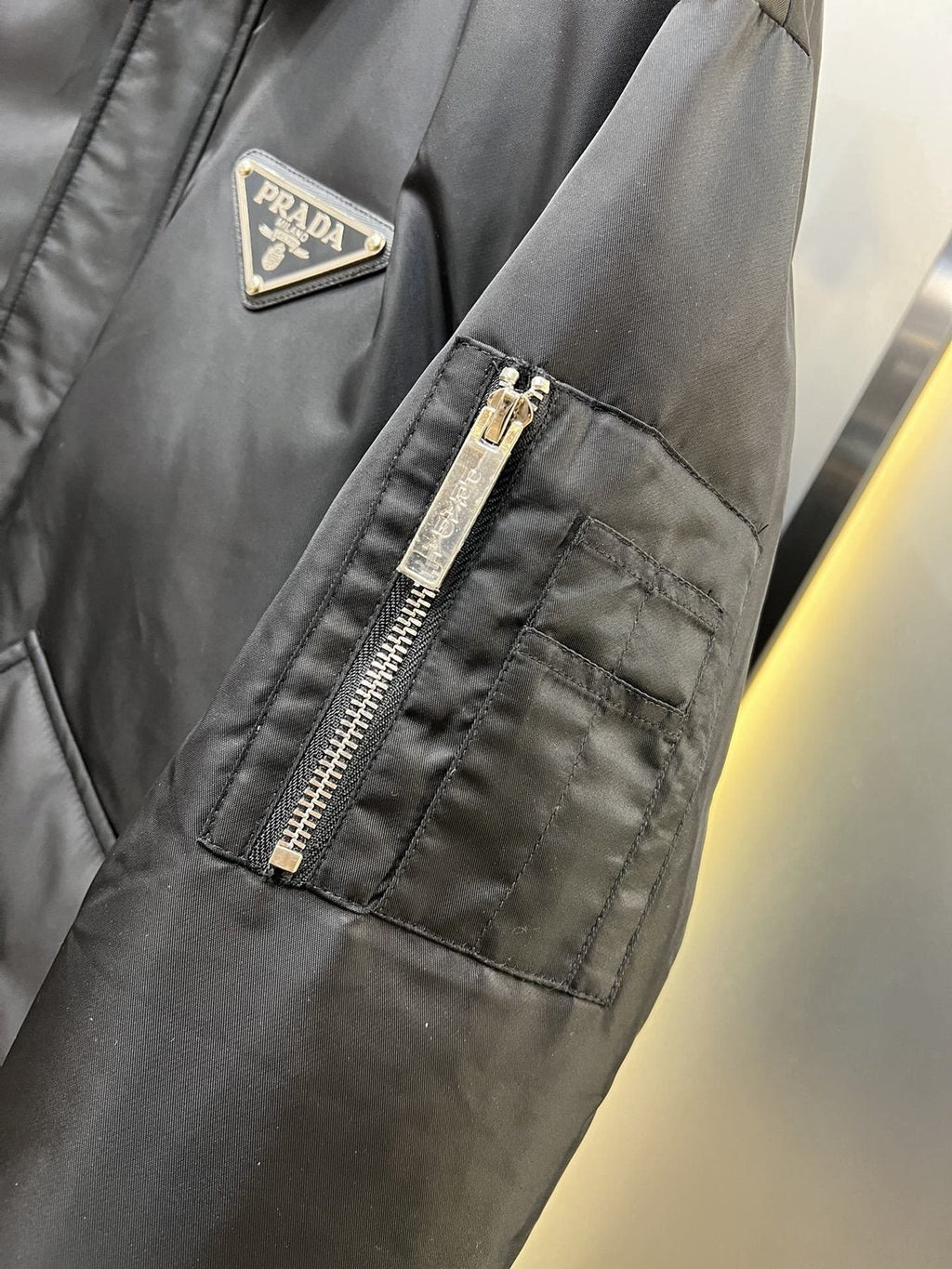 Prada Black Padded Zip-Front Puffer Jacket — detail