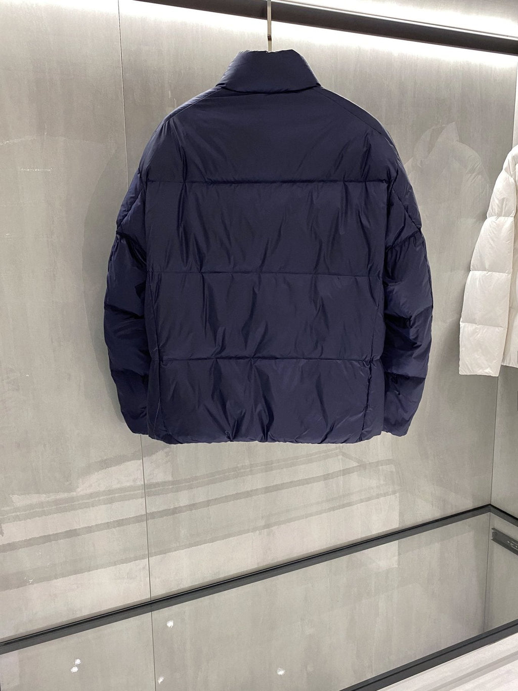 Prada Quilted Triangle Badge Puffer Jacket — back
