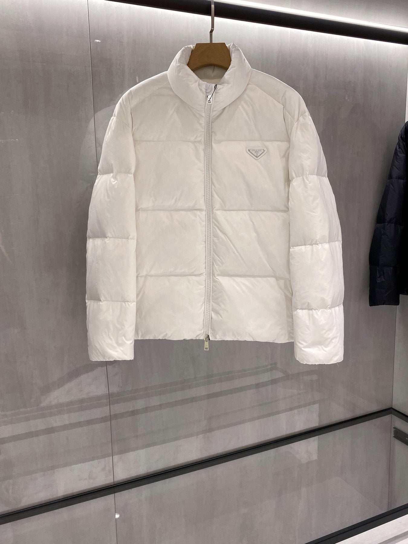 Prada Quilted Triangle Badge Puffer Jacket — front