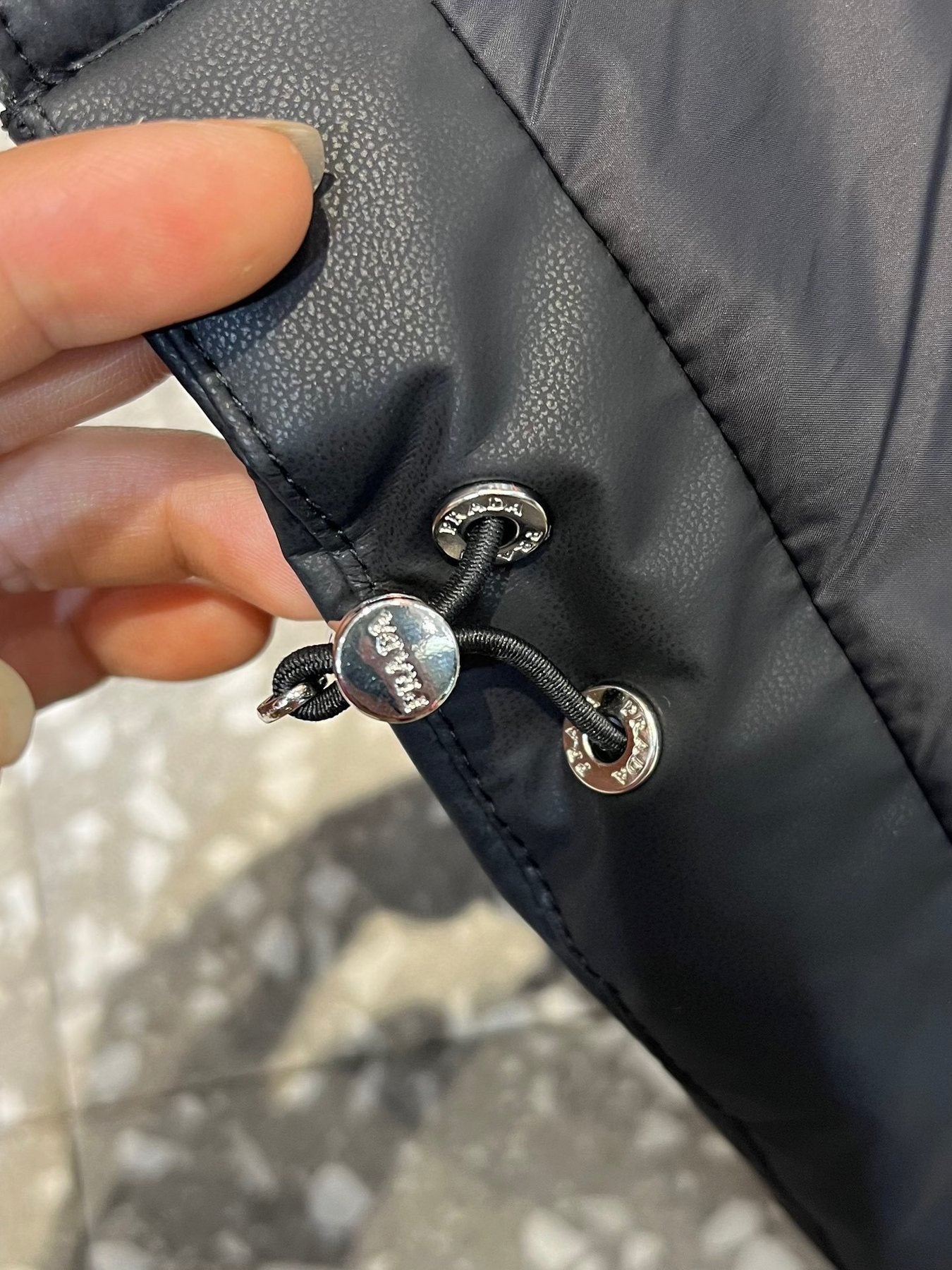 Prada Triangle Badge Padded Vest — detail