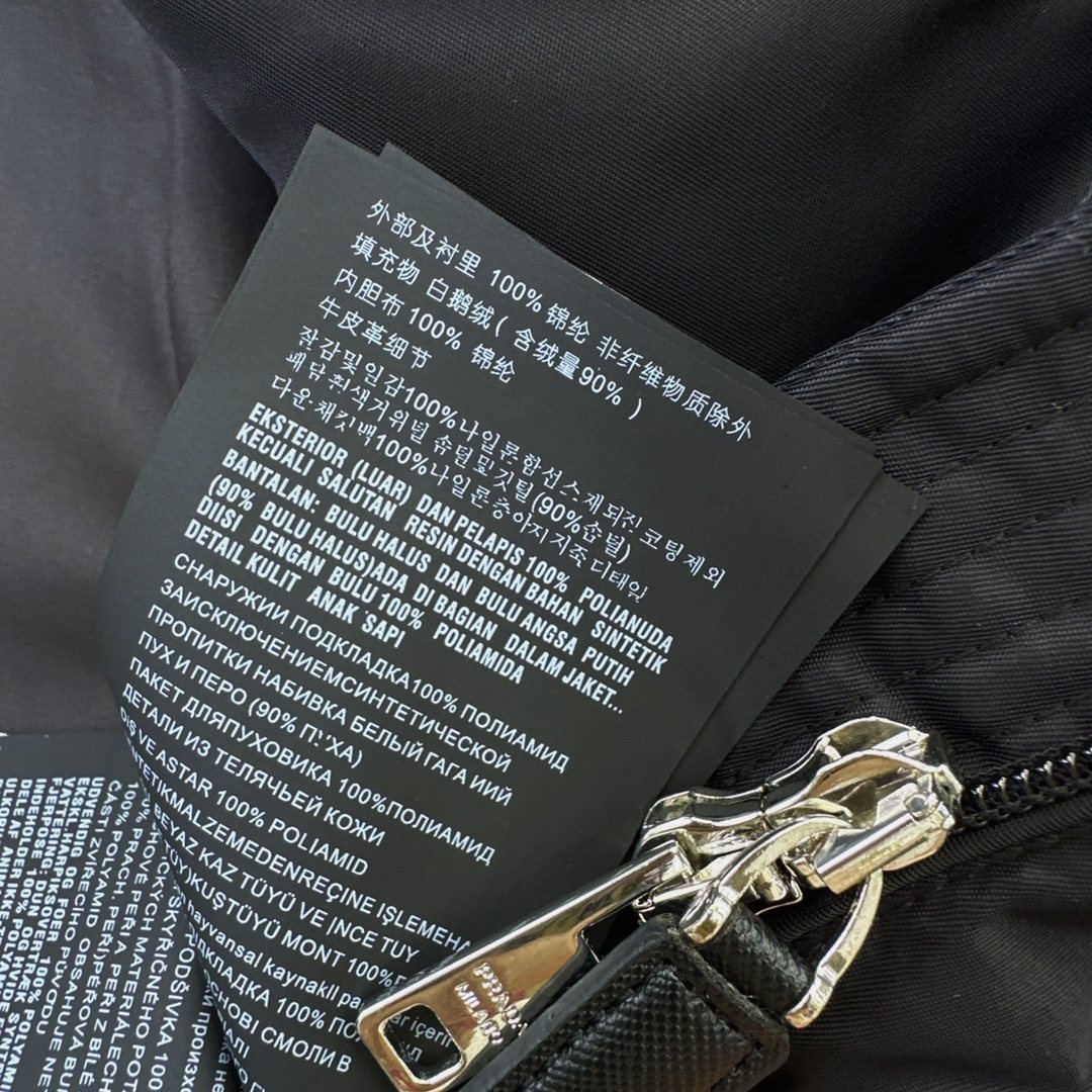 Prada Belted Hooded Puffer Jacket — fabric_closeup