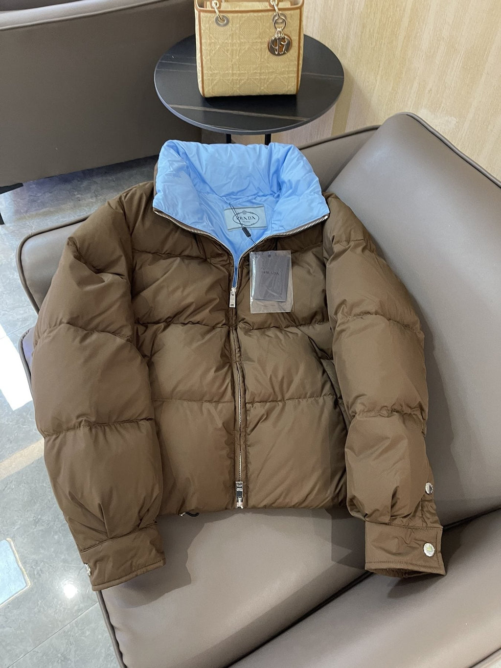 Prada Reversible Cropped Puffer Jacket with Removable Bow Scarf — front