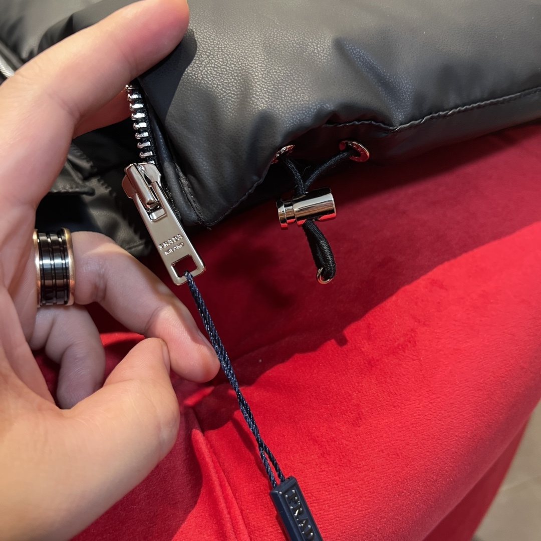 Prada Quilted Stand-Collar Puffer Jacket — detail