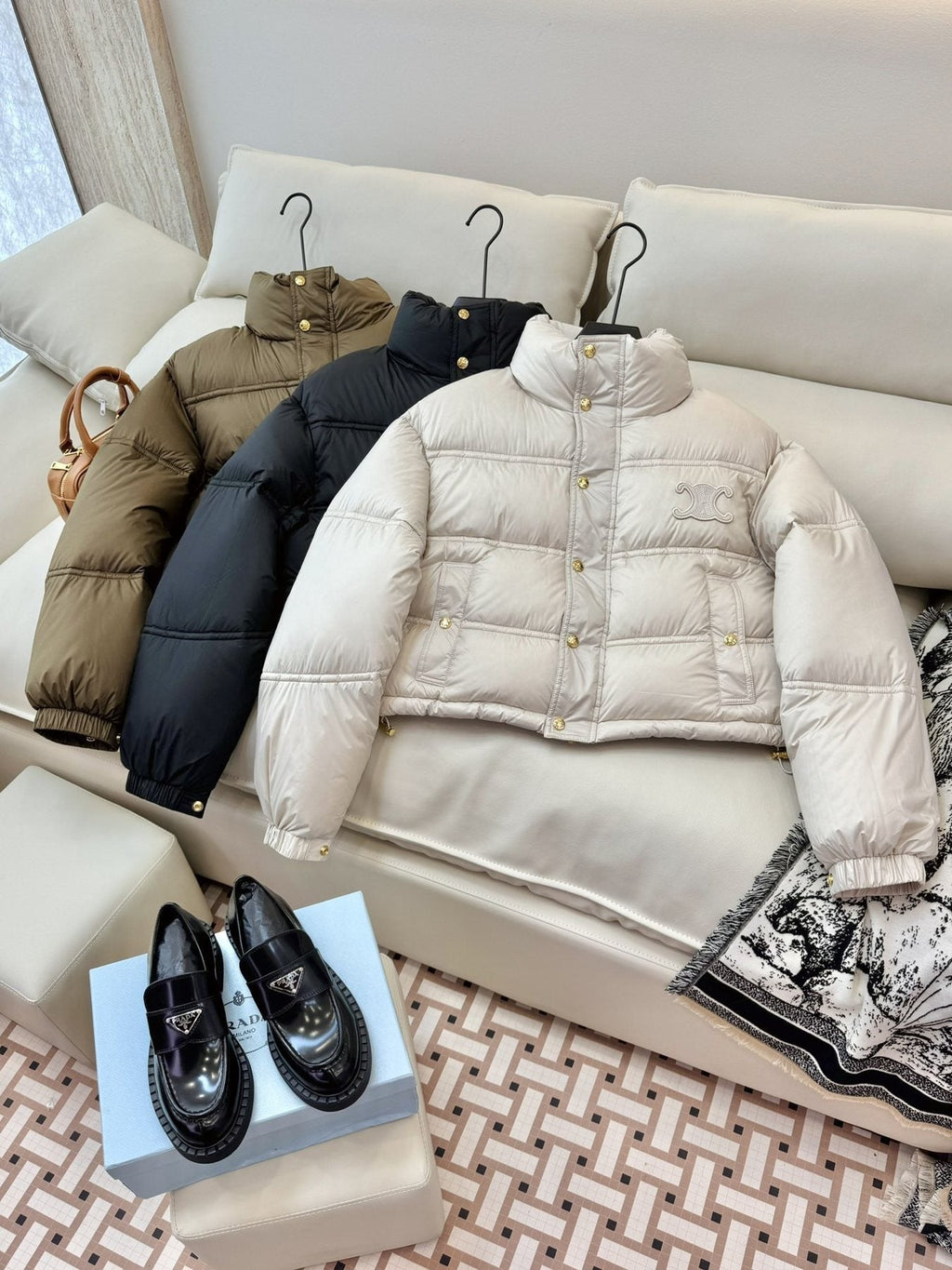 CELINE Cropped Triomphe Monogram Puffer Jacket — comparison