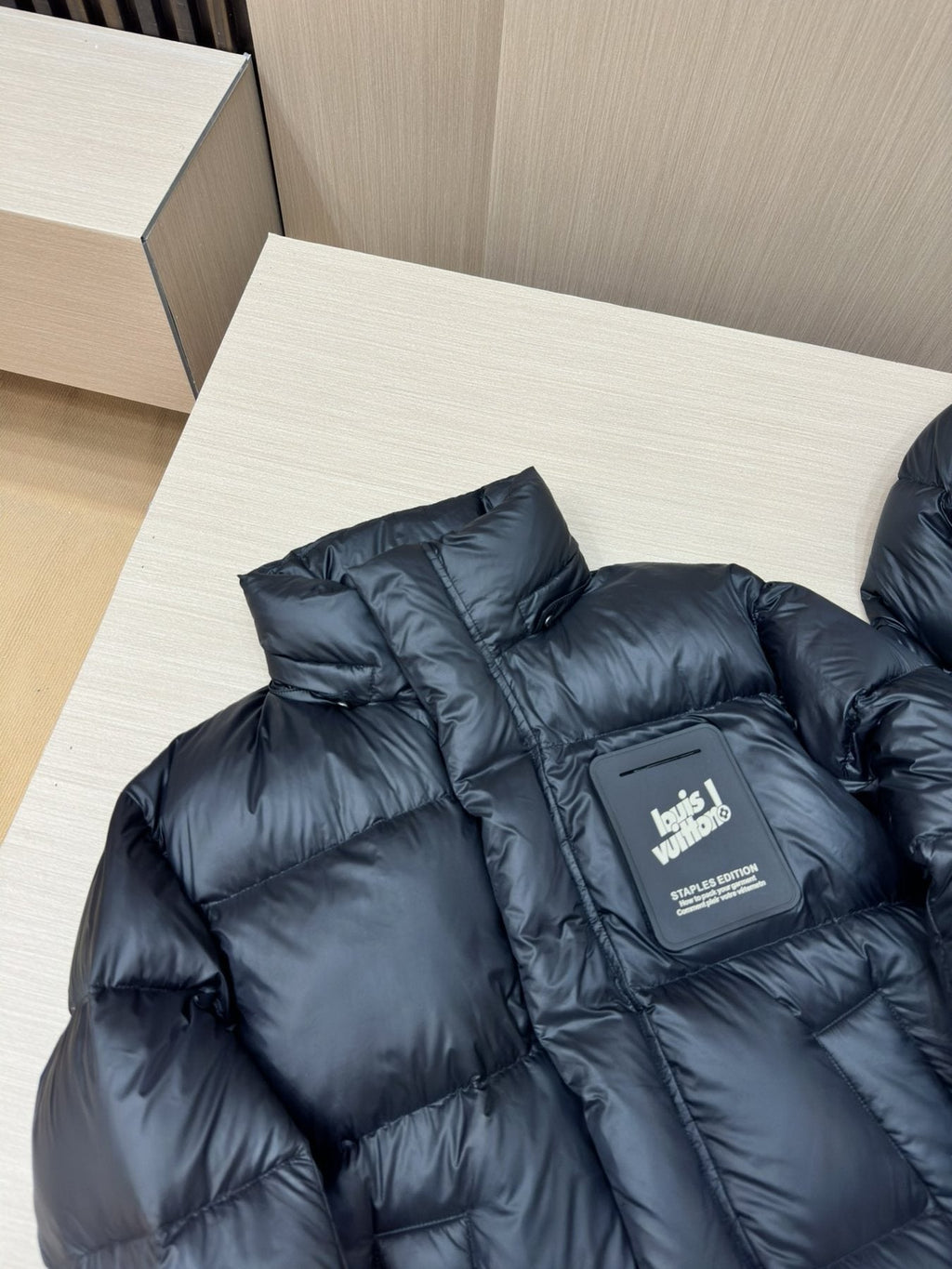LV Black Hooded Puffer Coat with Monogram Lining — detail