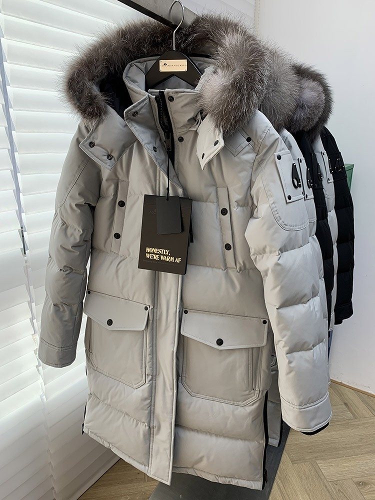 Moose Knuckles Women's Long Hooded Puffer Jacket — context