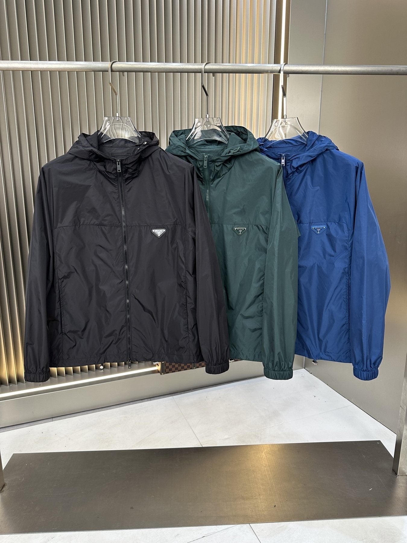 Prada Hooded Zip-Front Windbreaker — comparison