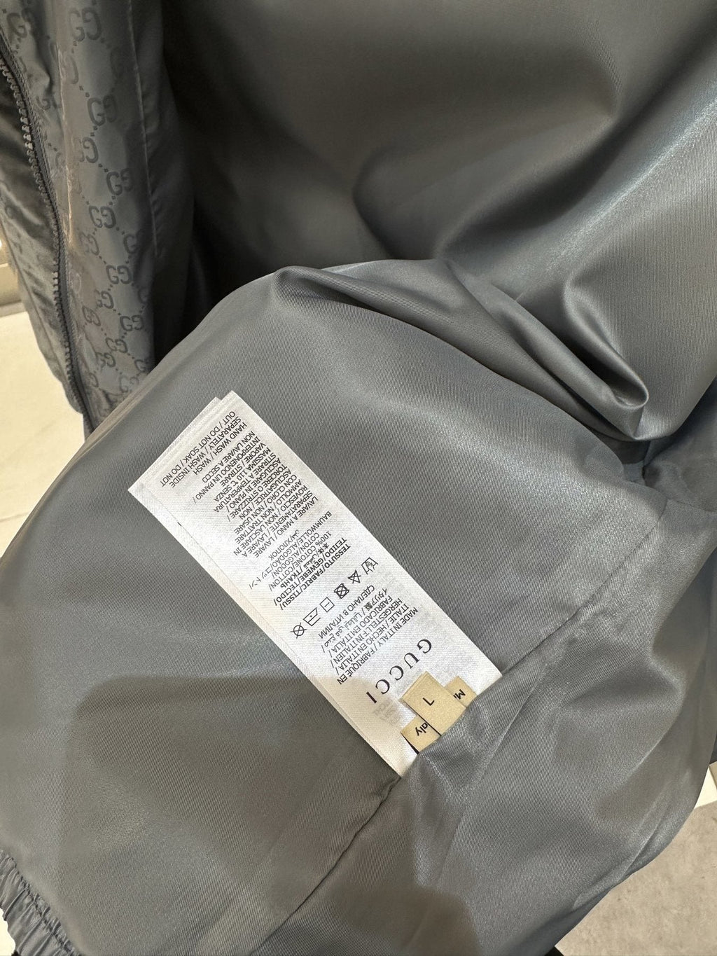 Gucci Monogram Hooded Zip Jacket — hang_tag