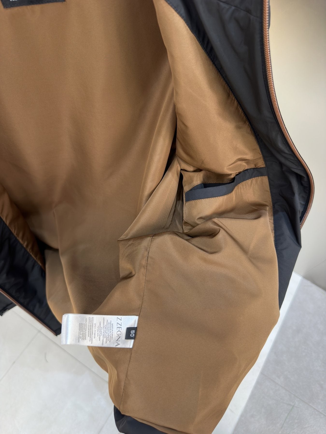 Zegna Zip-Front Utility Jacket — hang_tag