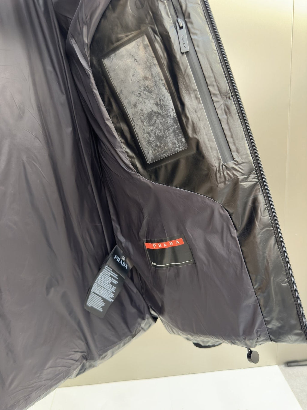 Prada Black Hooded Quilted Puffer Jacket — neck_label