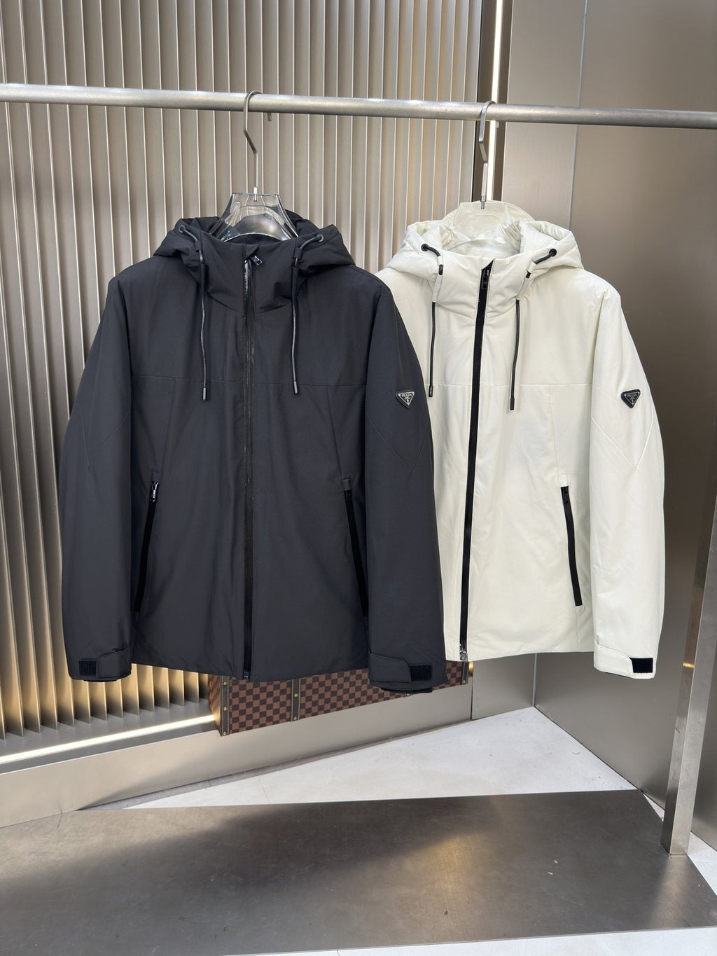 Prada Hooded Puffer Jacket — comparison