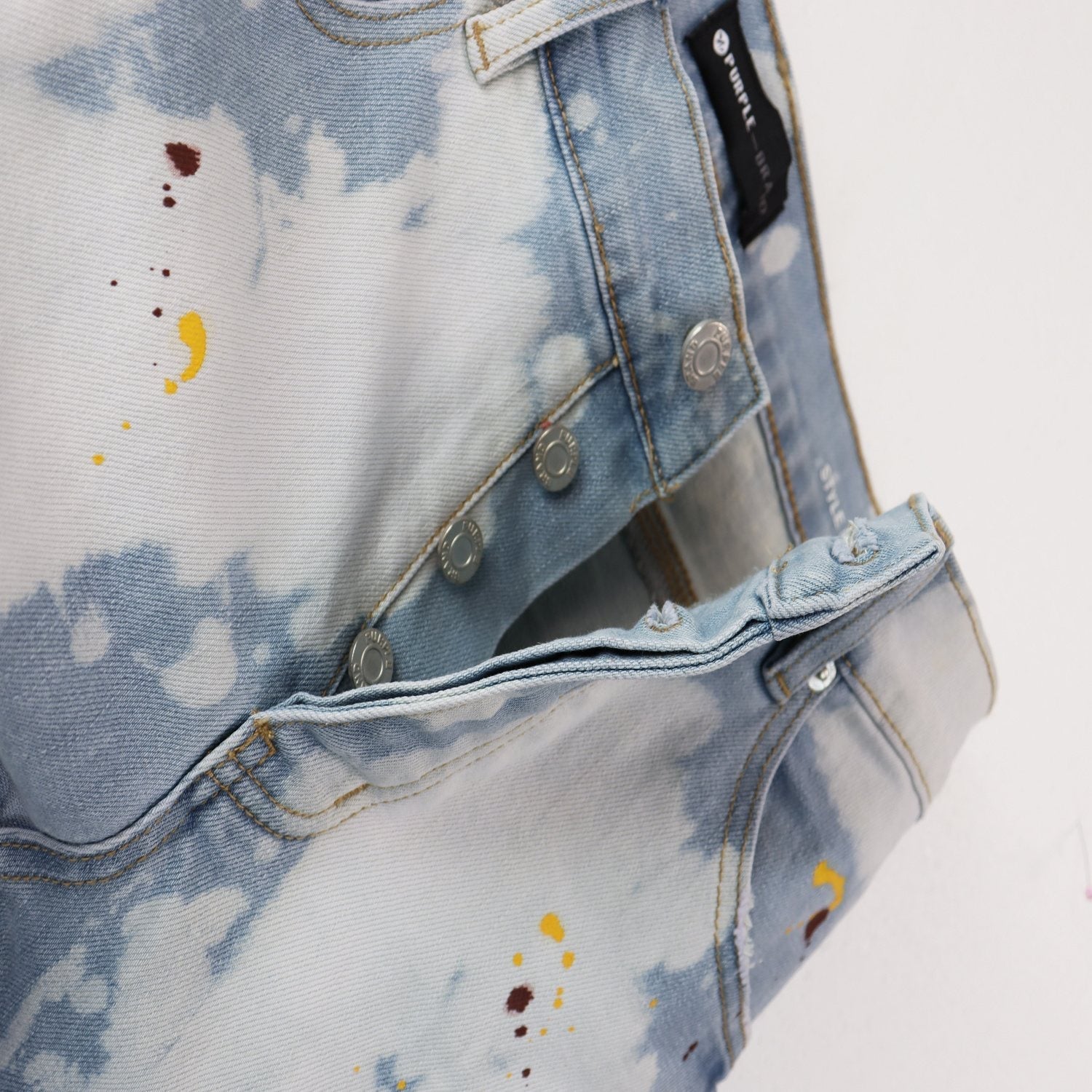 Purple Brand Light Blue Bleached Paint Splatter Skinny Jeans — detail
