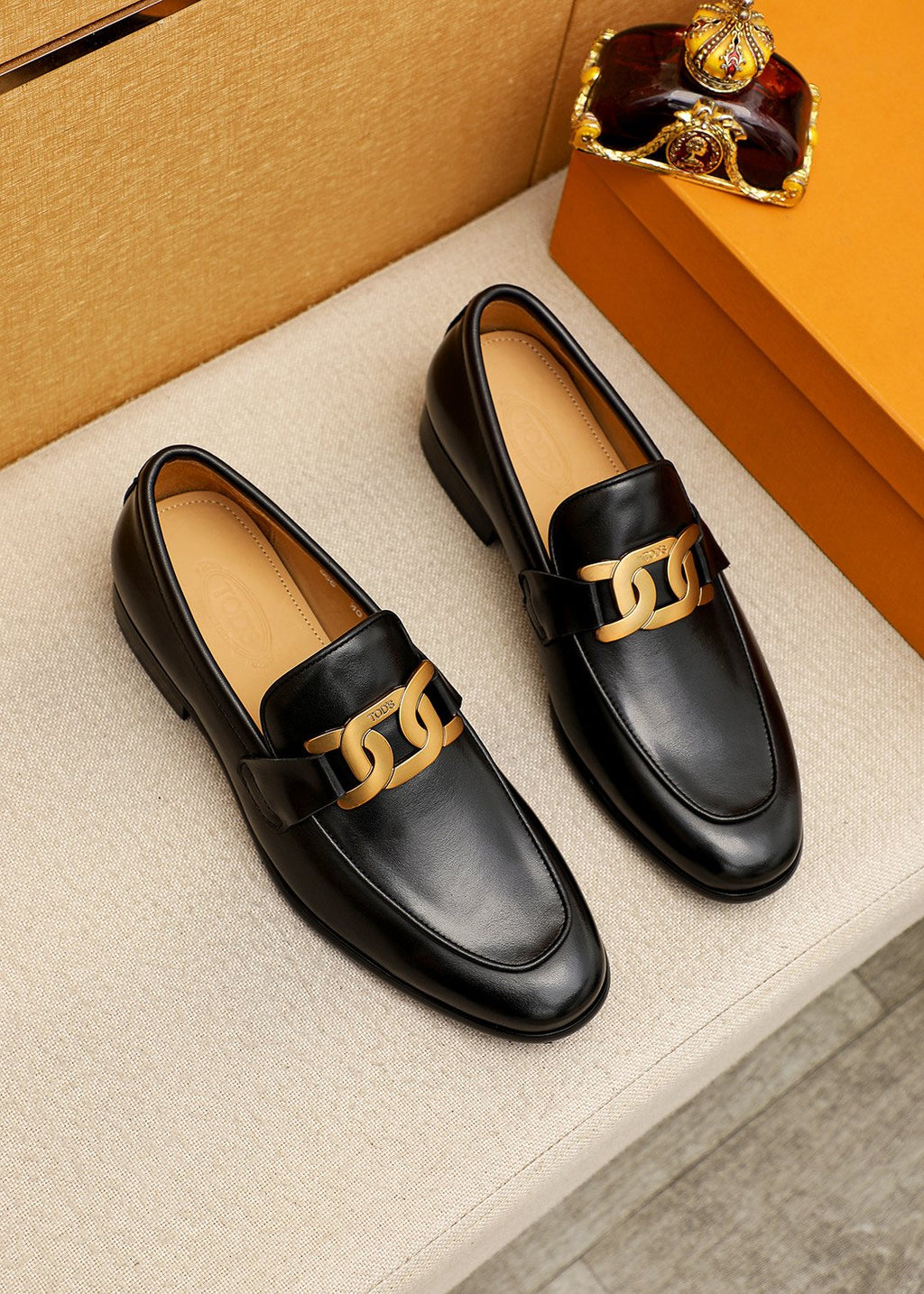 Tod's Black Gold-Hardware Loafers — hero