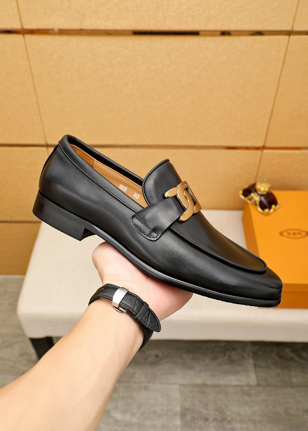 Tod's Black Gold-Hardware Loafers — model
