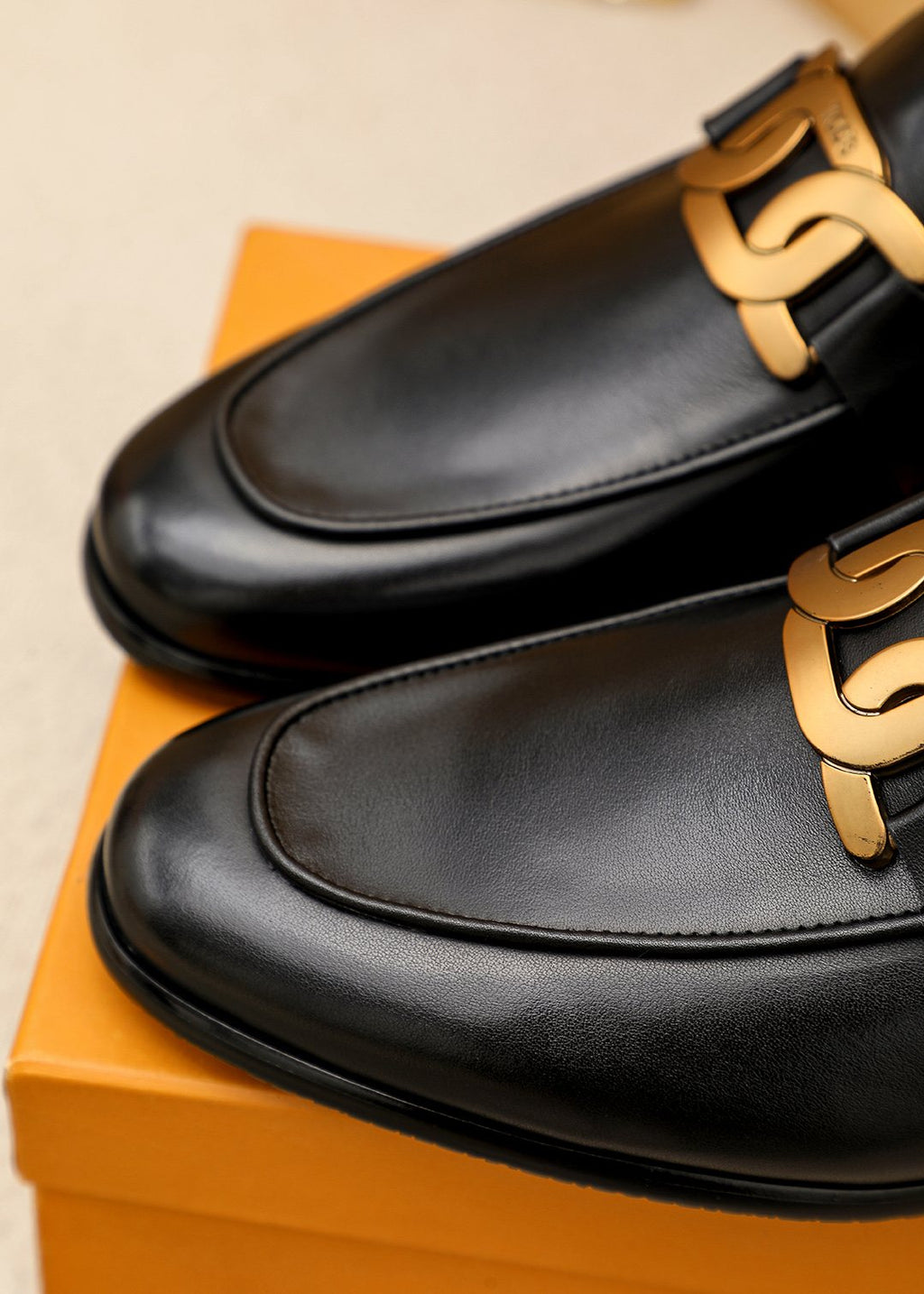 Tod's Black Gold-Hardware Loafers — detail