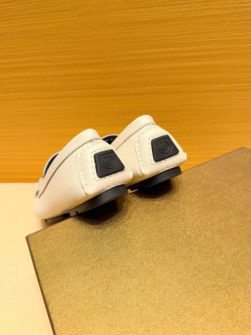 Ferragamo White Metal-Accent Loafers — detail
