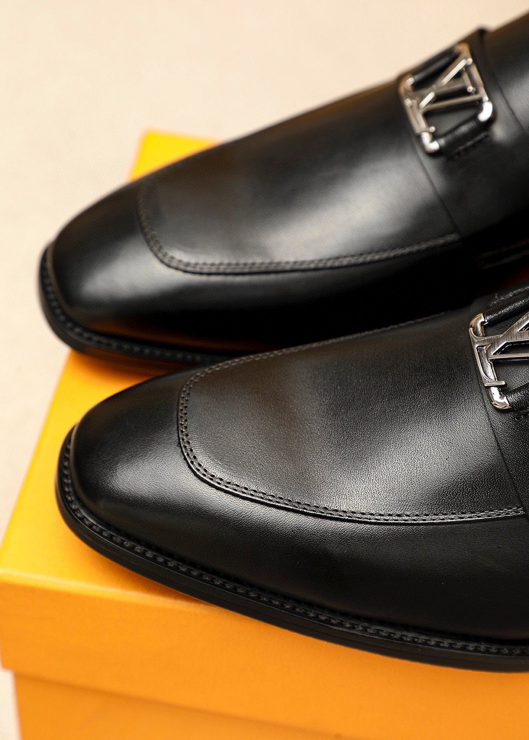 Louis Vuitton Black Metal-Accent Loafers — detail