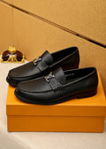 Louis Vuitton Black Pebbled Leather Loafers — hero