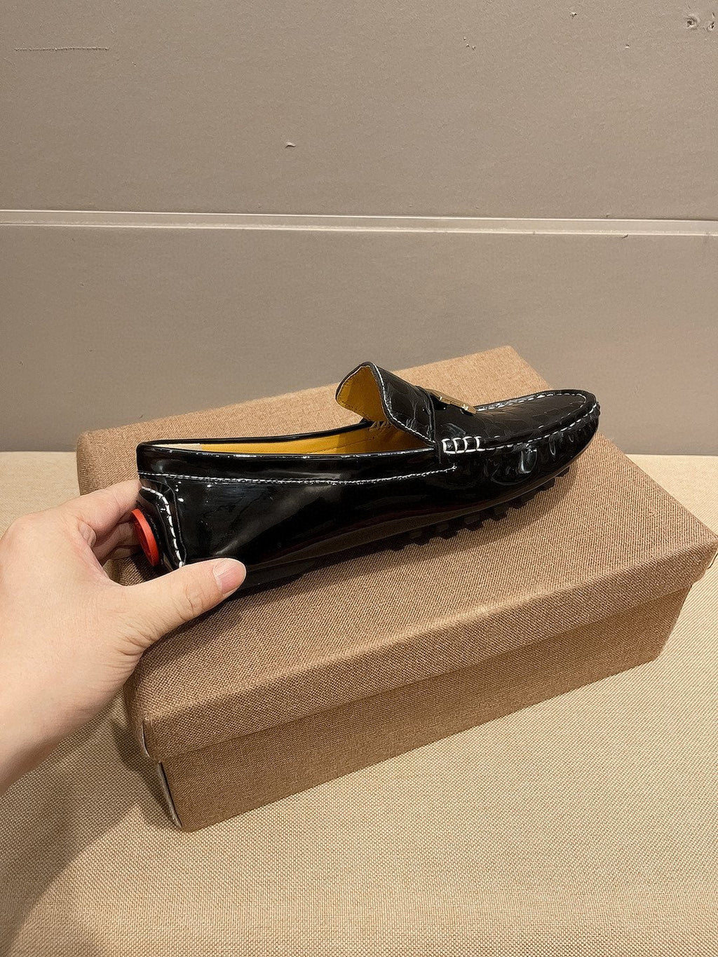 Hermès Black Textured Loafers — side