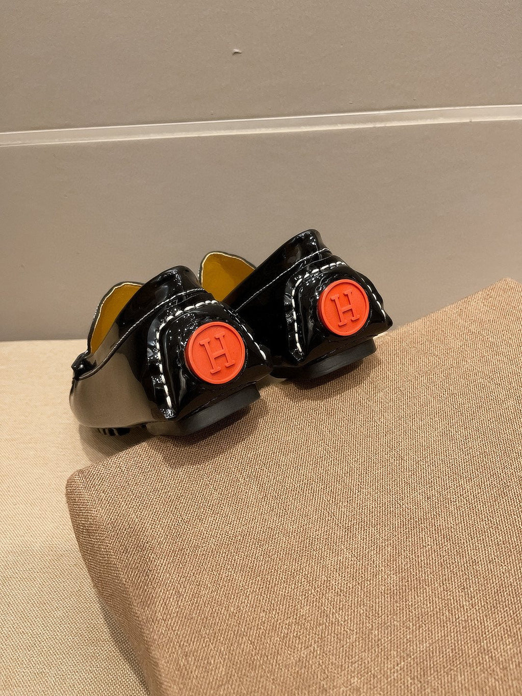 Hermès Black Textured Loafers — back