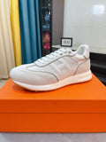 Hermès White and Light Gray Low-Top Sneakers — front