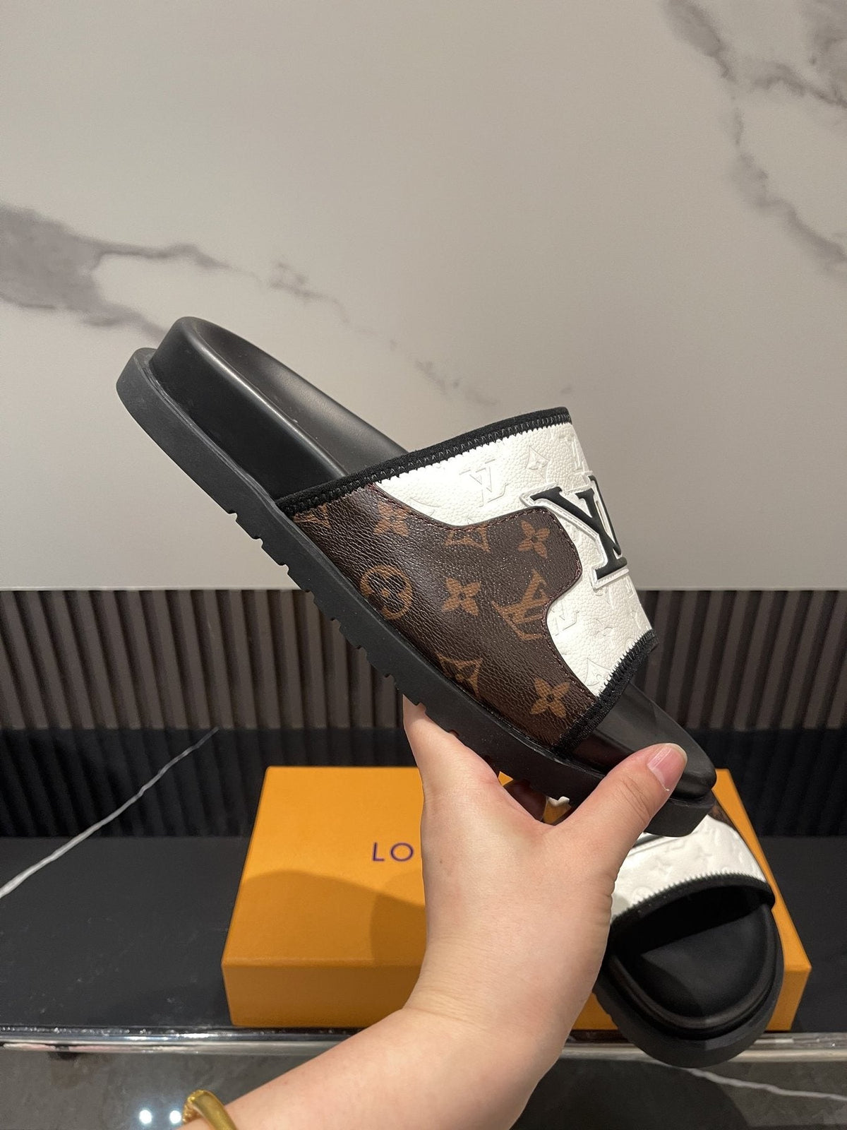Louis Vuitton Brown Patterned Slide Sandals — model