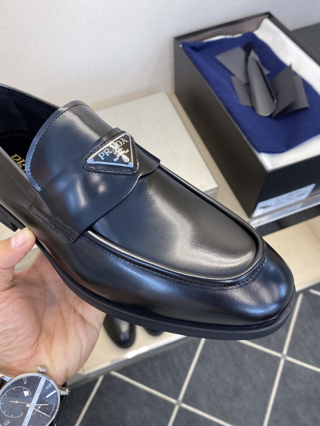 Prada Black Triangle Plaque Loafers — front