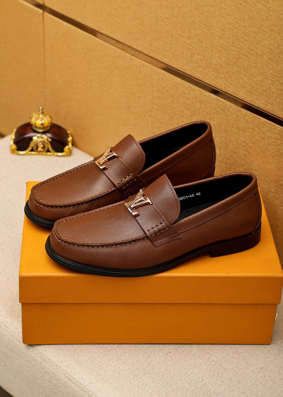 LOUIS VUITTON Brown Metal Hardware Loafers — front