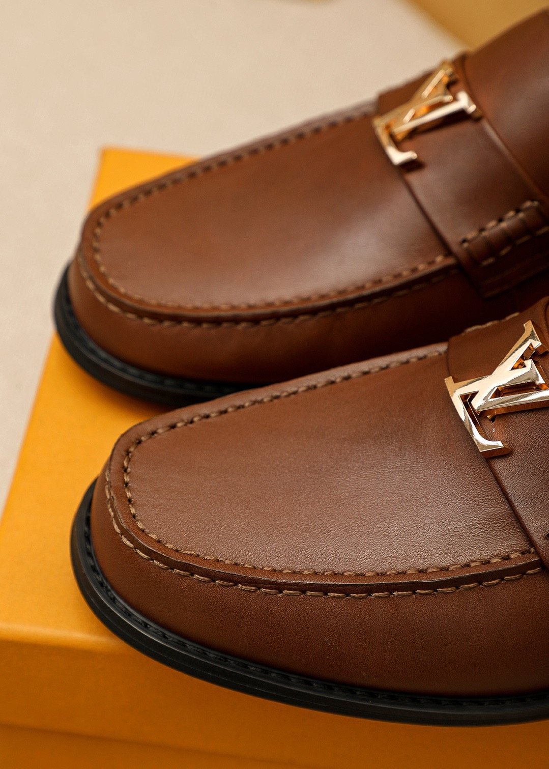 LOUIS VUITTON Brown Metal Hardware Loafers — detail