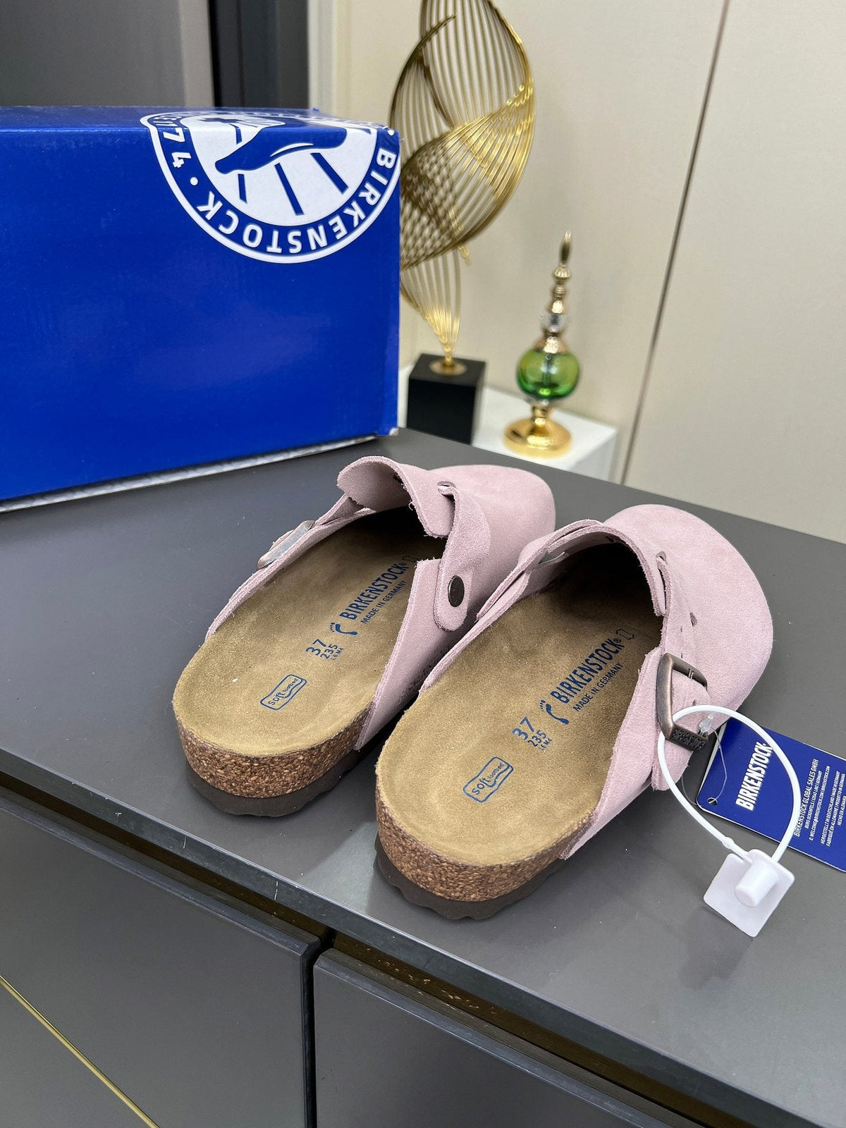Birkenstock Light Pink Buckle Clogs — side