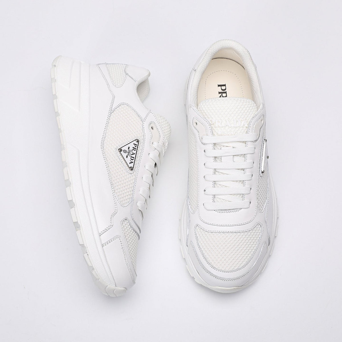 Prada White Leather Low-Top Sneakers — front
