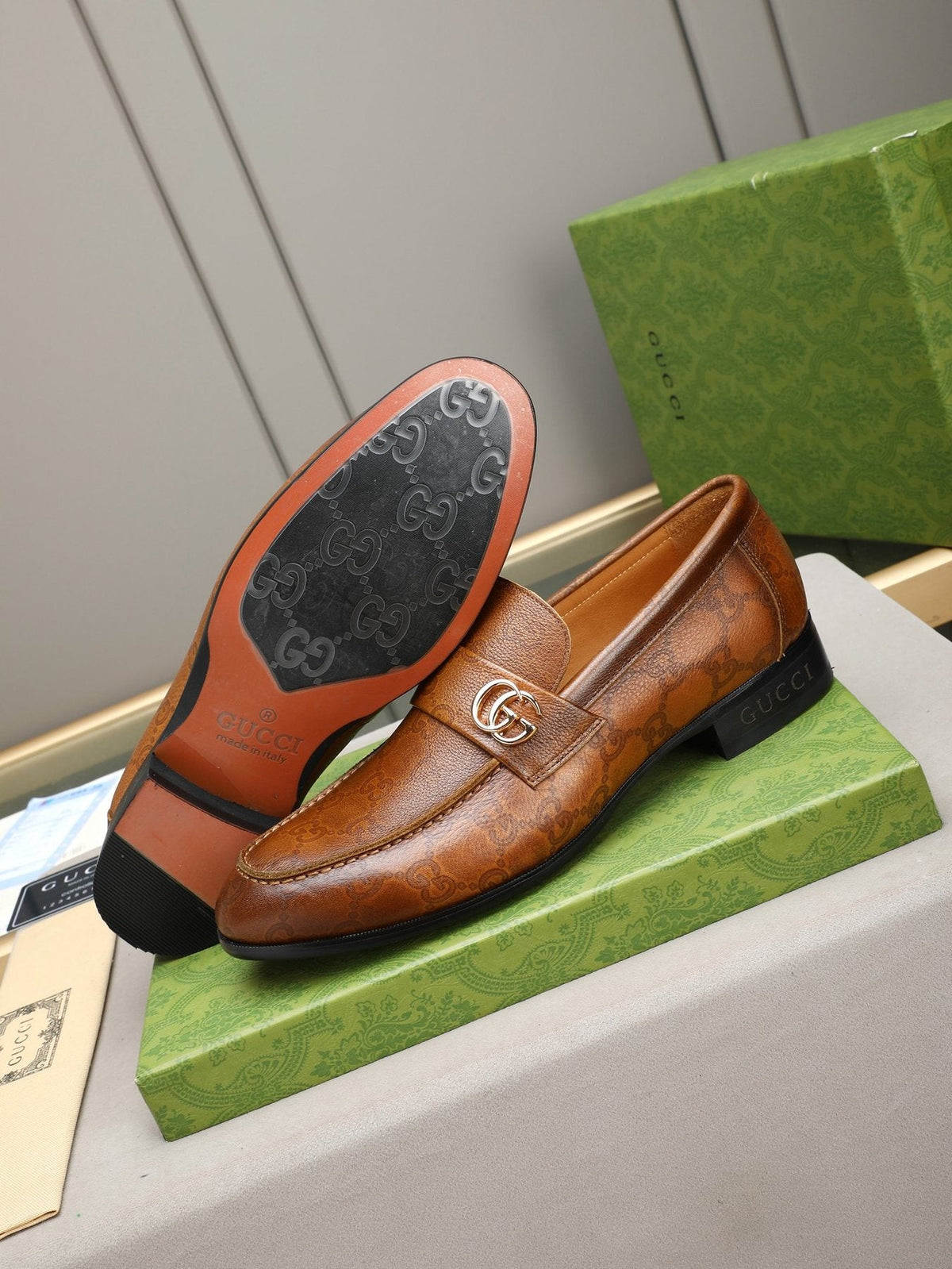 Gucci Brown Monogram Hardware Loafers — front