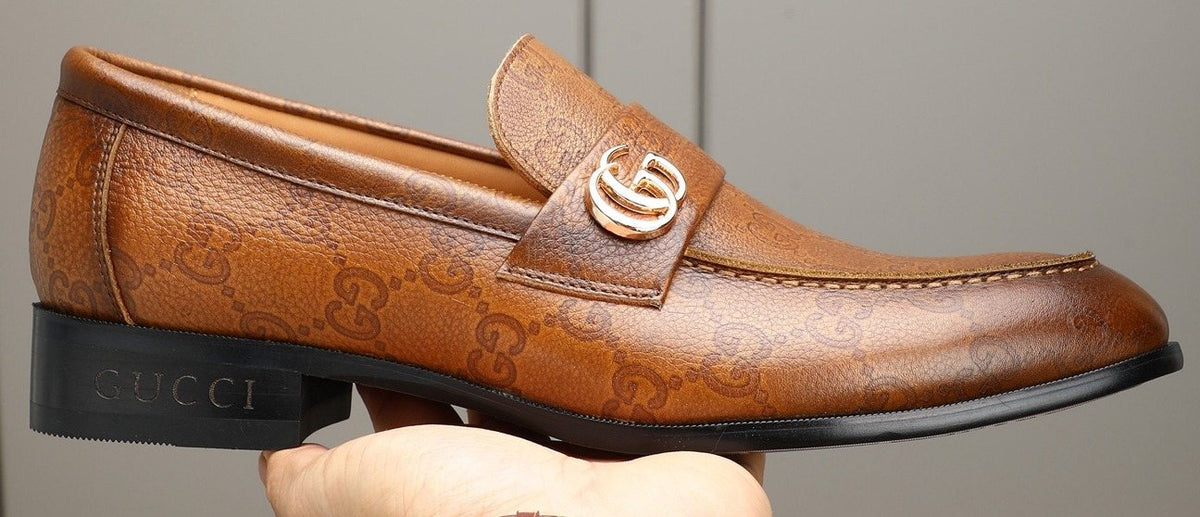 Gucci Brown Monogram Hardware Loafers — hero