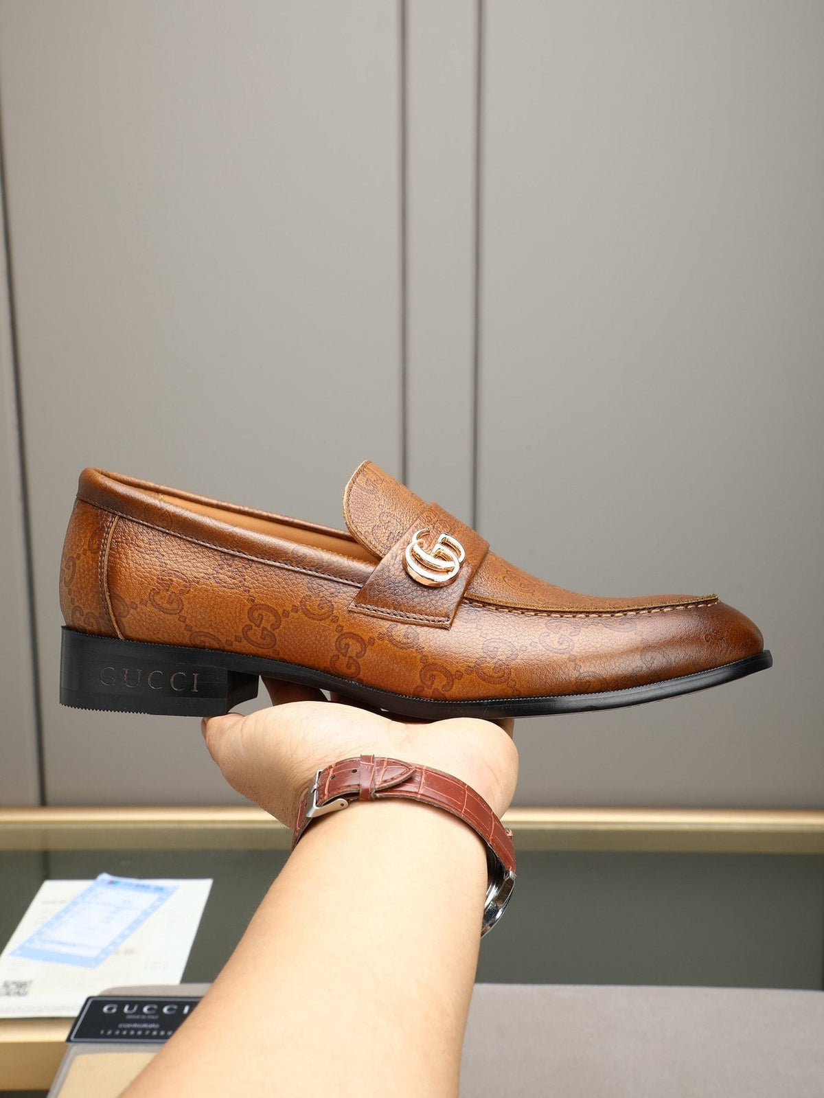 Gucci Brown Monogram Hardware Loafers — front