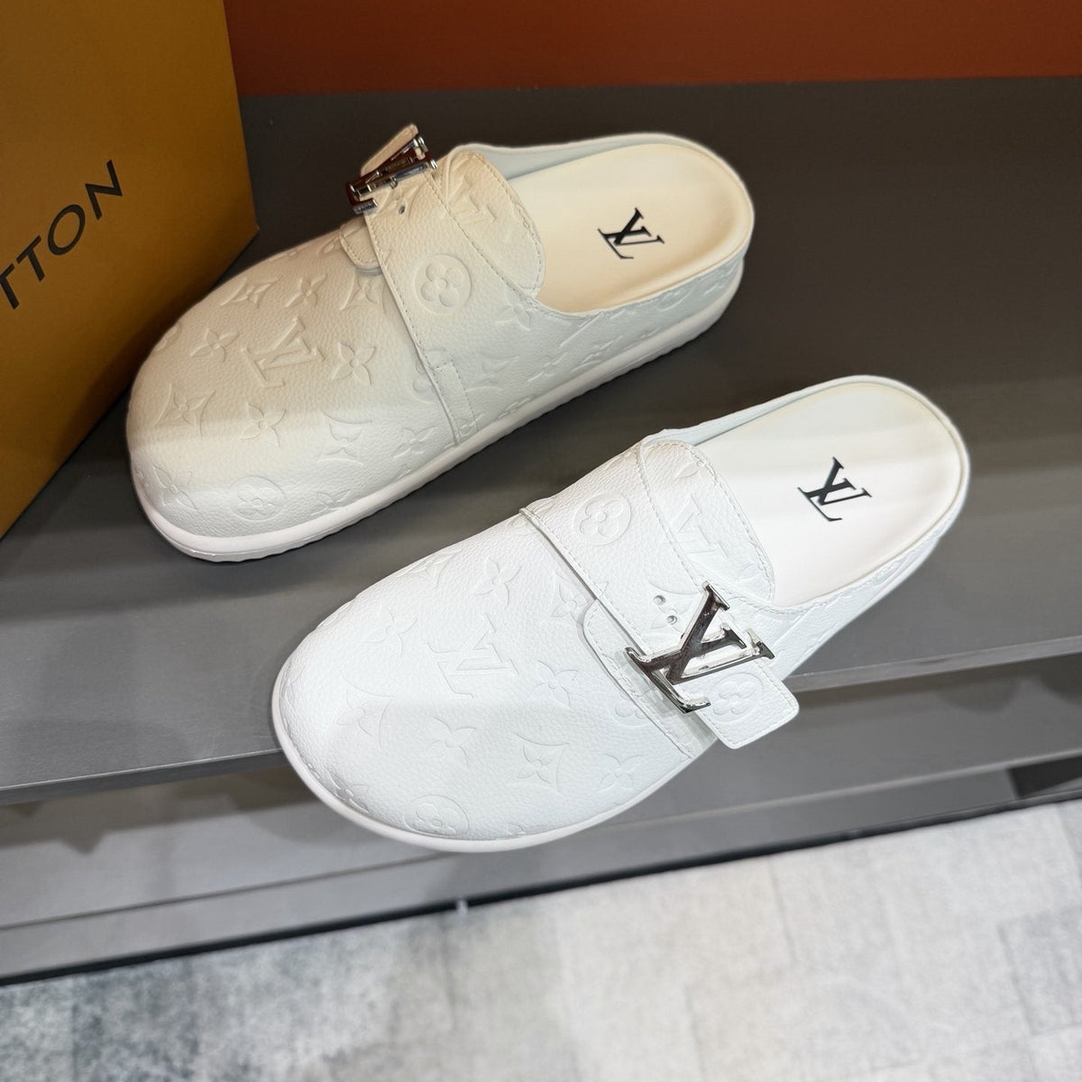 Louis Vuitton White Embossed Slide Sandals — front