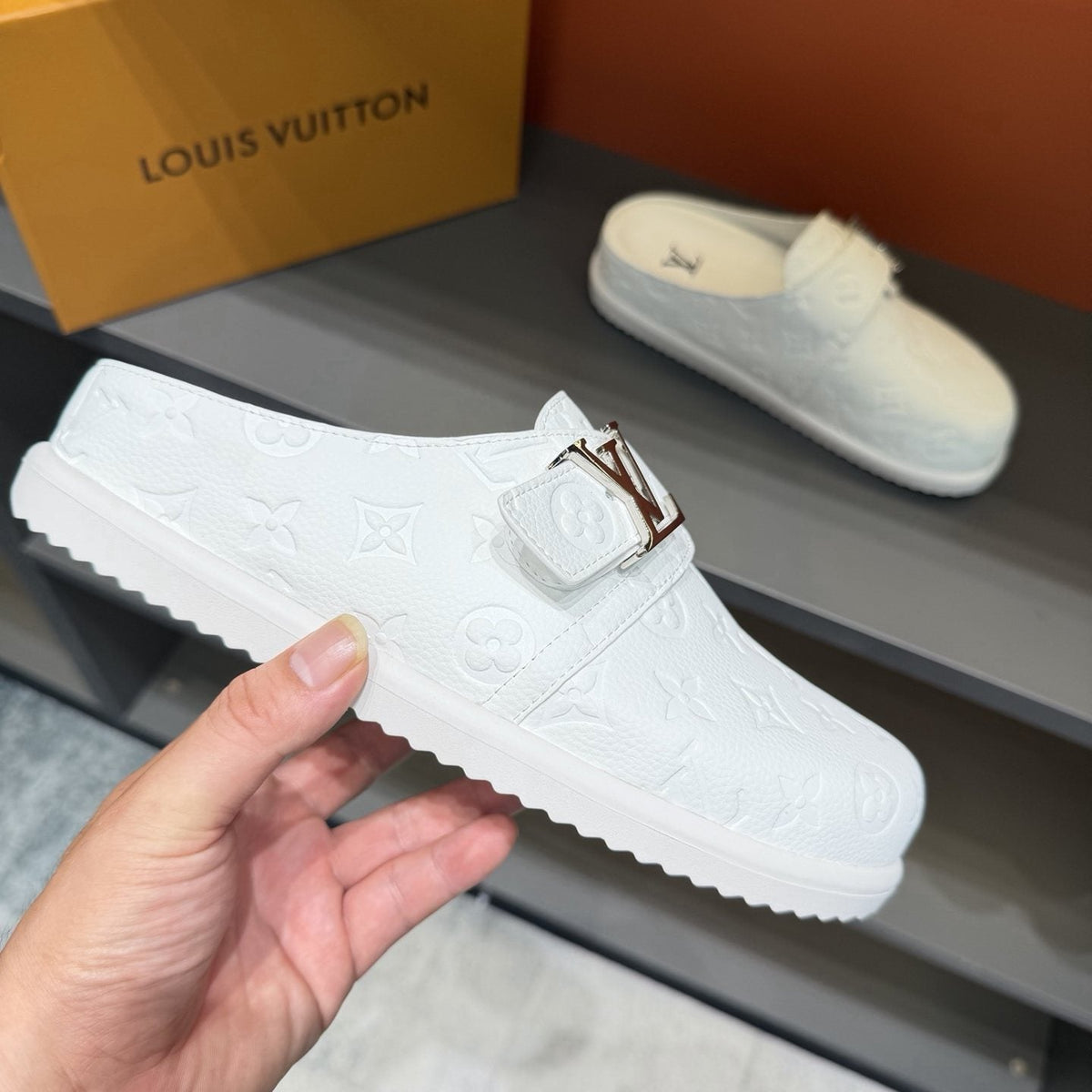 Louis Vuitton White Embossed Slide Sandals — side