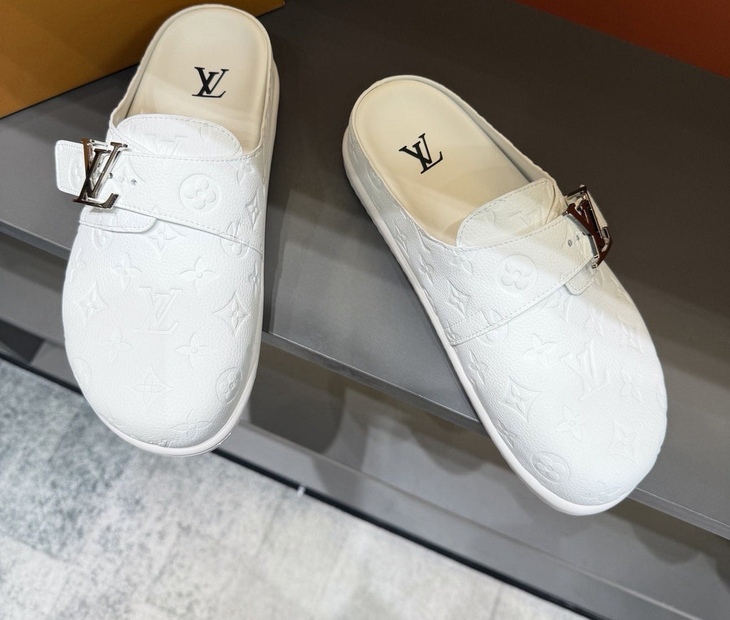 Louis Vuitton White Embossed Slide Sandals — front