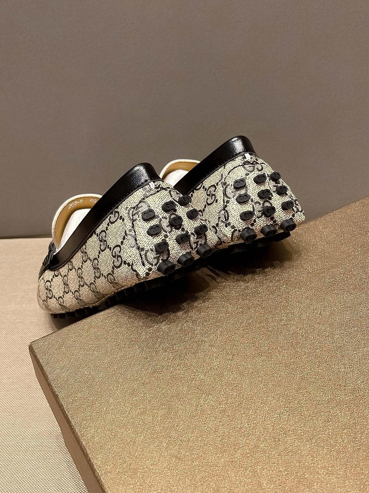 Gucci Beige and Black Gold-Hardware Loafers — back